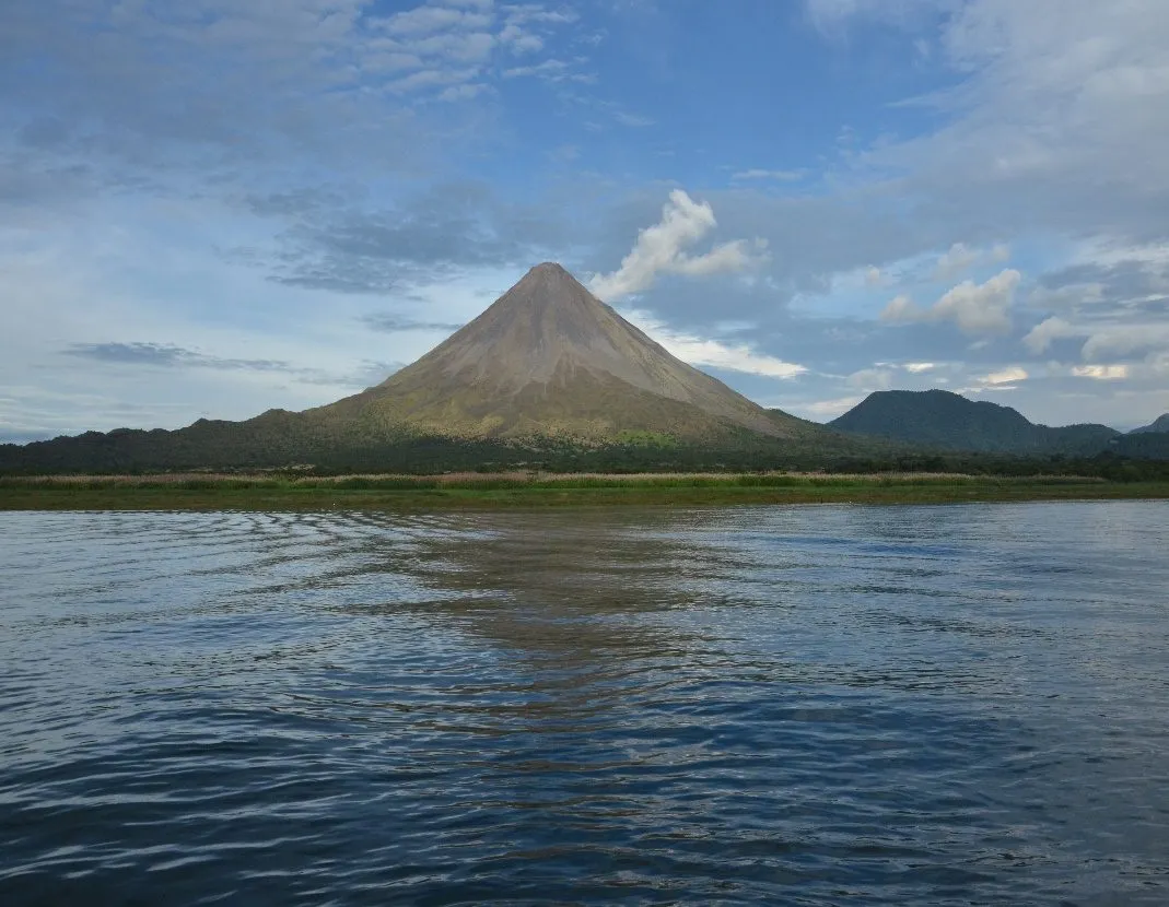 Arenal Volcano reflected over the lake, Costa Rica